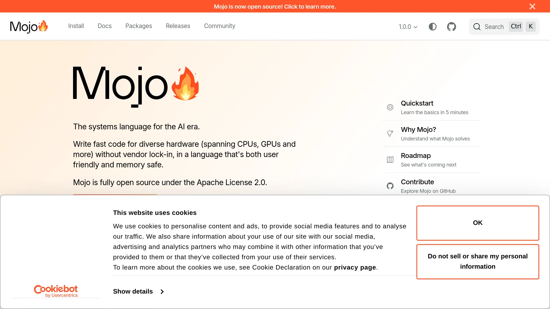 The mojolang.org homepage showing Mojo 1.0.0 stable and the open-source announcement